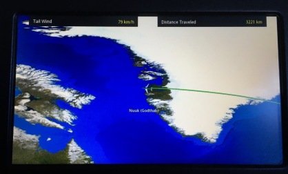 Airline in flight entertainment screen showing flight path on map over Nuuk, Greenland