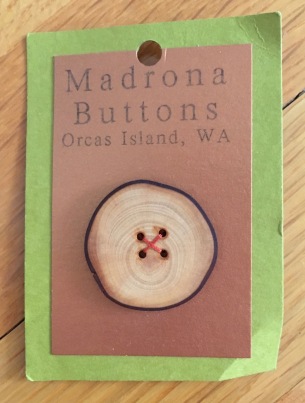 New Madrona wood button on display card