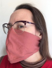 woman wearing loose fitting cloth face mask